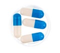 Close up of blue medical capsules