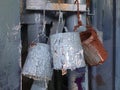 Close up Blue Paint bucket hanging on wall charni road mumbai