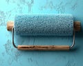 Rustic Textured Paint Roller on a Freshly Painted Blue Wall Royalty Free Stock Photo