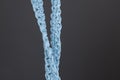 Close up of blue raffia cord on grey background Royalty Free Stock Photo