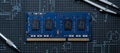 Close-up of a blue RAM module on a blueprint background with tools Royalty Free Stock Photo
