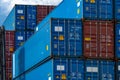 Close-up blue and red logistic container. Cargo and shipping business. Container ship for import and export logistics. Logistic Royalty Free Stock Photo