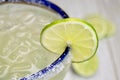 Salted margarita with lime slice