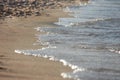 Close up blue sea water waves on sand beach Royalty Free Stock Photo