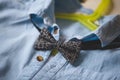 Close-up of blue shirt with a bow tie on a hanger. Black bow tie with scientific symbols. Clothes. Special occasion suit Royalty Free Stock Photo