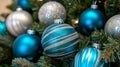 A close up of blue and silver ornaments on a christmas tree Royalty Free Stock Photo
