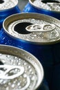 Soda cans with open pull tab and condensation