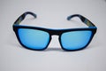 Close up blue sun glasses isolated on White Background Royalty Free Stock Photo