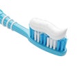 Close-up of a blue toothbrush with white toothpaste on its bristles Royalty Free Stock Photo
