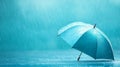 Close-up of a blue umbrella covered in raindrops during heavy rainfall Royalty Free Stock Photo