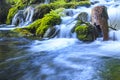 Close up of blue waterfalls in a green forest during daytime in Summer.Plitvice lakes, Croatia