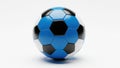 Close up of a blue and white soccer ball with black hexagonal panels Royalty Free Stock Photo