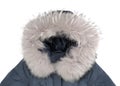 Close-up. Blue winter women`s down jacket with a fur collar. Iso