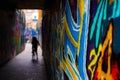 Close up of a blue and yellow graffity in Werregarenstraat Graffiti Street in Ghent, Belgium, Europe, with defocused background