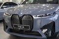 close-up BMW electric SUV model ix in Studio, Exterieur electric vehicle in showroomr, alternative energy development concept,