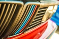 Close up of BMW Motorsport stripes on the grill of a classic 3 series