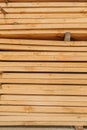 Close up board pine stack building materials high parallel folded dry building design pattern Royalty Free Stock Photo
