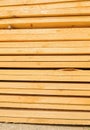 Close up board pine stack building materials high parallel folded dry building design pattern Royalty Free Stock Photo