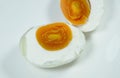 Boiled salty egg half cut on plate Royalty Free Stock Photo