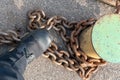 Close-up of bollards and iron chains on an old River barge. Securing the ship with a large chain. Old rusty vintage mooring Royalty Free Stock Photo