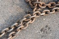 Close-up of bollards and iron chains on an old River barge. Securing the ship with a large chain. Old rusty vintage mooring Royalty Free Stock Photo