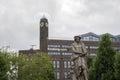 Close Up Booking.com Building At The Background With Rembrandt Statue At Amsterdam The Netherlands 25-7-2022 Royalty Free Stock Photo