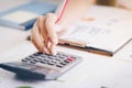 Close up of bookkeeper or financial inspector hands making report, calculating or checking balance.Investment, economy, saving mo Royalty Free Stock Photo