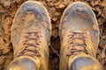 close-up of boot soles covered with mud Royalty Free Stock Photo