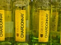 Close up of bottles Chardonnay wine in shelf of german supermarket Royalty Free Stock Photo