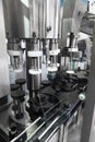 Close-up of bottling and cork machine in red wine production Royalty Free Stock Photo