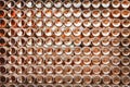 Bottoms of brown beer bottles group patterns texture on wall abstract for background Royalty Free Stock Photo