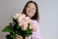 Close-up of bouquet of white, pink roses, in hands of adult woman, brought flowers on date with girlfriend, boyfriend, gives to Royalty Free Stock Photo