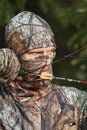 Close-up bow hunter wearing camouflage Royalty Free Stock Photo