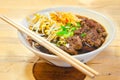 Close up of a bowl of Chinese style beef noodle soup