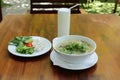 Close up of a bowl Chinese style on wooden background ,Beef Noodle Soup