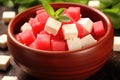 close-up of a bowl filled with juicy watermelon cubes and feta cheese Royalty Free Stock Photo