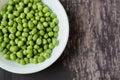 Close up of a bowl of fresh English pea