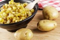 Close up of a bowl of fried Potatoes Royalty Free Stock Photo