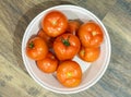 Close-up at a bowl full of fresh tomatoes