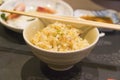 Close up of a bowl of garlic fried rice
