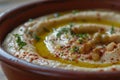 Close Up of a Bowl of Hummus, A detailed close-up of a bowl filled with Hummus and olive oil, AI Generated