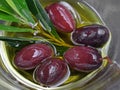 Close up, bowl of kalamon olives in oil