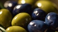 a close up of a bowl of olives with green ones in the middle of the bowl and blue ones in the middle of the bowl