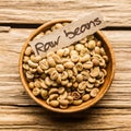 Close up of a bowl of raw coffee beans Royalty Free Stock Photo