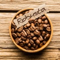Close up of a bowl of Robusta coffee beans Royalty Free Stock Photo