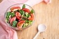 Close-up of a bowl of summer salad on the table. Royalty Free Stock Photo