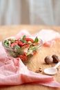 Close-up of a bowl of summer salad on the table. Royalty Free Stock Photo