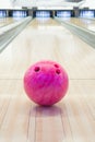 Close-up of a bowling ball in an alley