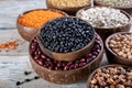 close up bowls with black and red beans