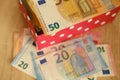 close-up box with family savings, cash 50, 20 euro banknotes on table, concept gift for holiday, payments, savings, banking, Royalty Free Stock Photo